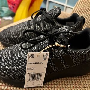 Big kids Adidas shoes. New with tags. Never worn.